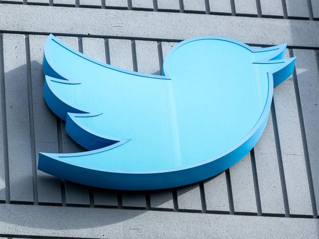 The Twitter logo is seen on a sign on the exterior of Twitter headquarters in San Francisco, California, on October 28, 2022. - After months of controversy, Elon Musk is now at the head of one of the most influential social networks on the planet, whose 