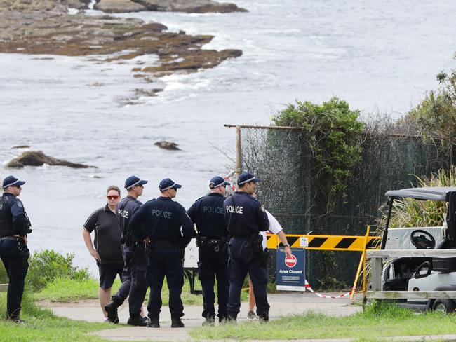 Police at Little Bay speaking with people flouting social distancing laws. Picture: Matrix Media