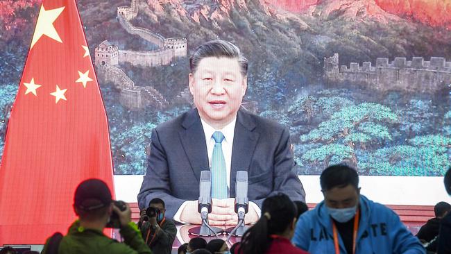 Journalists should remember public shows of strength by “president for life” Xi Jinping and his predecessors are usually aimed at a domestic Chinese audience. Picture: STR/AFP