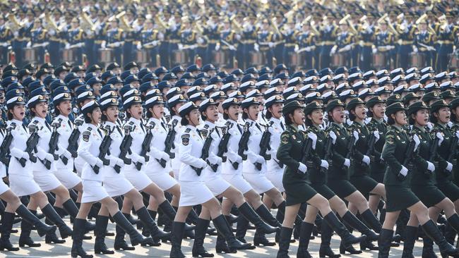 China’s female wolf warriors march in celebration of the 70th anniversary of the founding of Communist China. Picture: AFP