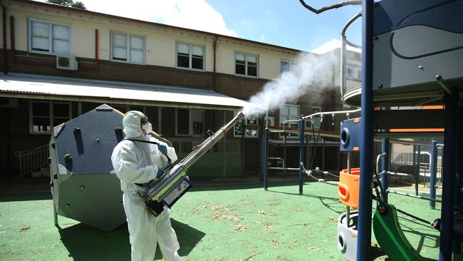 Workers in hazmat suits were seen spraying disinfectant on to every surface. Picture: NCA NewsWire/Joel Carrett