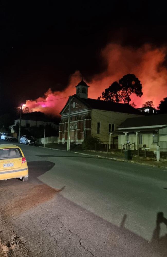 Taken by radio announcer Andrew Roberts on 7XS when arriving to work early in the morning. Bushfire burning to the south of Queenstown on Tasmania's West Coast. Picture: Andrew Roberts