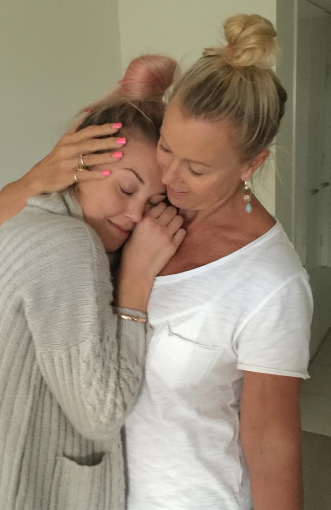 A beautiful hug with a beautiful daughter … Lisa and Jaimi, in a photo from memoir Lisa, courtesy of Millie Thomas.