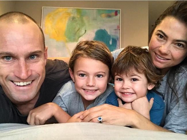 Fitzy with his young sons Hewy and Lenny, and his wife, Belinda.