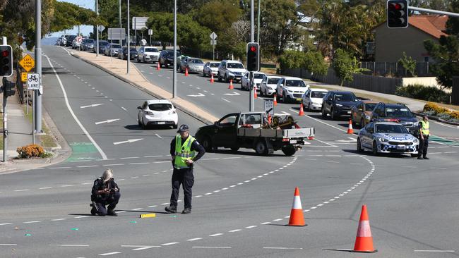 Police investigate the scene of the crash on the corner of Queen and Nerang St in Southport. Picture Glenn Hampson