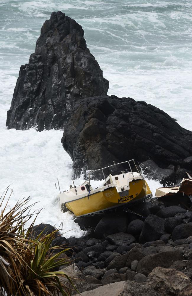 A yacht has been abandoned on the rocks at Burleigh Headland. (Photo/Steve Holland)