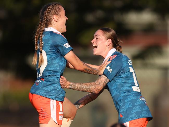 NEWCASTLE, AUSTRALIA - DECEMBER 21: Laini Freier of the Roar celebrates a goal with Sharn Freier of the Roar during the round seven A-League Women's match between Newcastle Jets and Brisbane Roar at No. 2 Sports Ground, on December 21, 2024, in Newcastle, Australia. (Photo by Scott Gardiner/Getty Images)