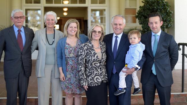 Prime Minister Malcolm Turnbull with family (from left) Tom and Christine Hughes, daughter Daisy Turnbull Brown, wife Lucy Turnbull, PM Malcolm with grandson Jack and son-in-law James Brown after being sworn in as Australia's 29th Prime Minister at Government House in Canberra. Picture: AAP