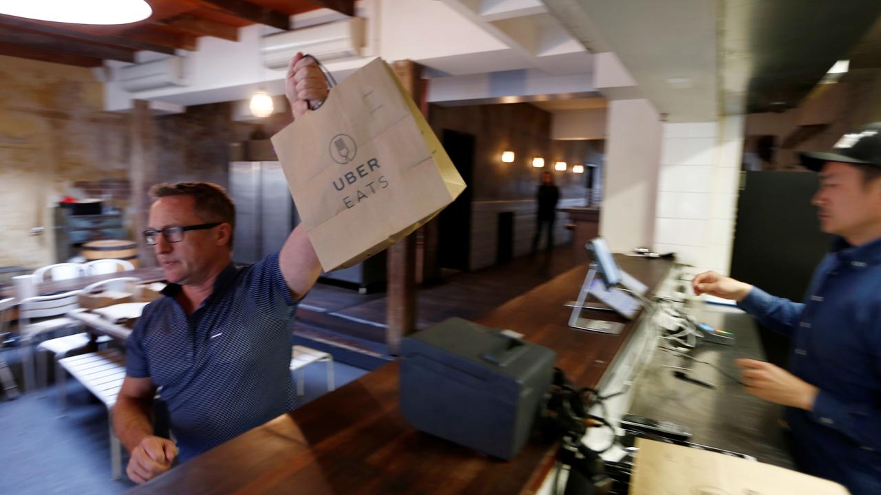 Tony Plunkett, pictured in Australia’s first ever ‘dark kitchen’ — a restaurant run entirely on deliveries by Uber — says after initial success things quickly fell apart. Picture: Jason Reed/Reuters