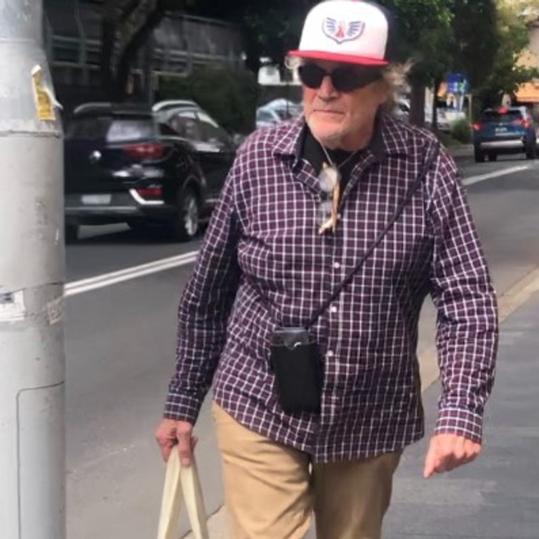 John McNeill, 69, a musician of Avalon Beach, outside Manly Local Court on Tuesday, March 18, 2025, where he faced a charge of use carriage service to menace/harass/offend. Picture: Manly Daily.