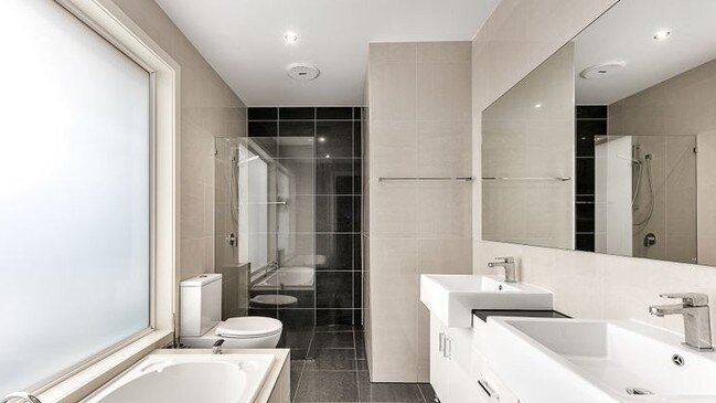 The home’s two bathrooms come with contemporary flair.