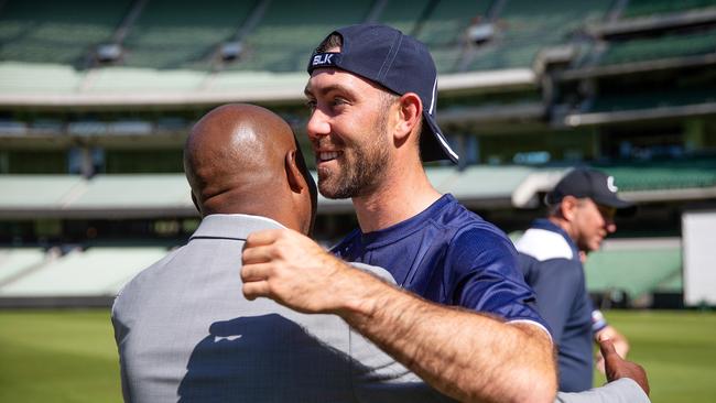 Brian Lara embraces Glenn Maxwell. Picture: Mark Stewart