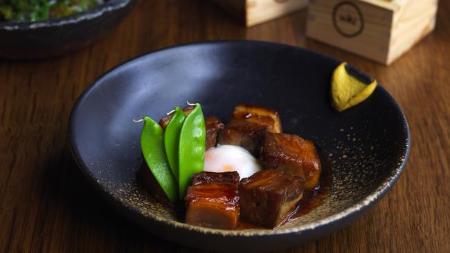 Sweet soy braised pork belly with onsen egg and hot mustard at Sake.