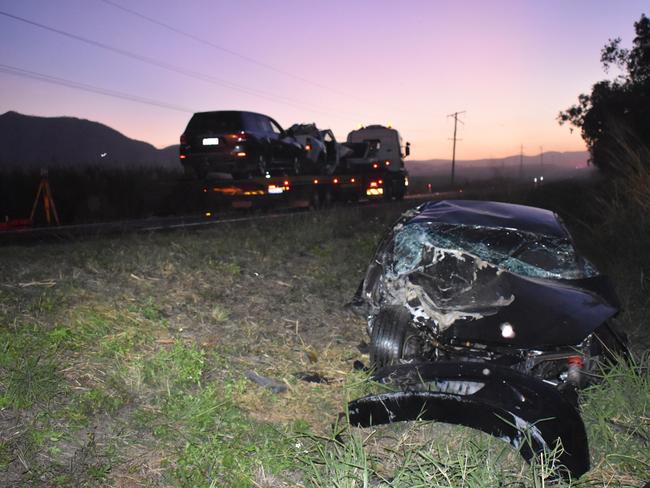 Tragic scenes at a fatal crash on the Bruce Highway near Pindi Pindi. Picture: Lillian Watkins