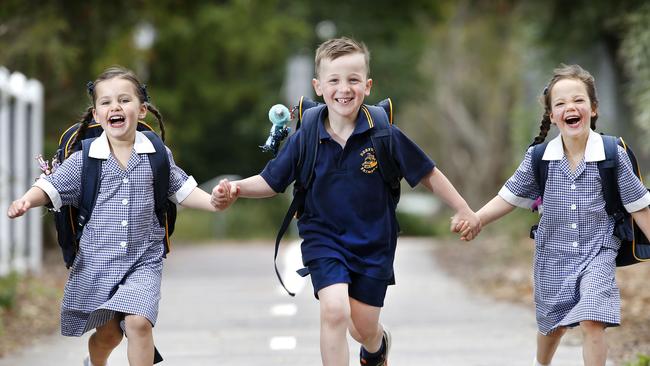 Alice, 4, Tom, 5 and Ruby, 4 are excited to start school. Picture: David Caird