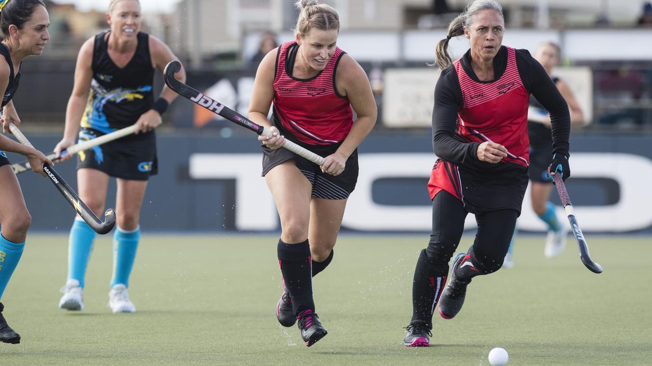 Jodie Borg (centre) of Rockhampton 1 against Gold Coast 1.