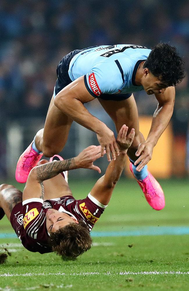 Joseph-Aukuso Suaalii irons out Reece Walsh. Picture: NRL Photos