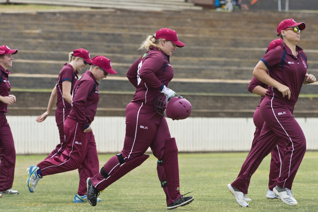 Carly Cooper (centre) and her Queensland teammates take to the field for the game against Western Australia in Australian Country Cricket Championships women's division round four at Heritage Oval, Tuesday, January 7, 2020. Picture: Kevin Farmer