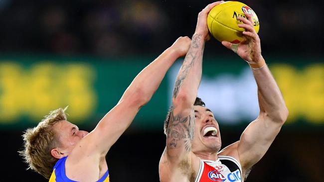 MELBOURNE, AUSTRALIA - JULY 20: Josh Battle of the Saints attempts to mark over Jack Hutchinson of the Eagles during the round 19 AFL match between St Kilda Saints and West Coast Eagles at Marvel Stadium, on July 20, 2024, in Melbourne, Australia. (Photo by Josh Chadwick/AFL Photos/via Getty Images)