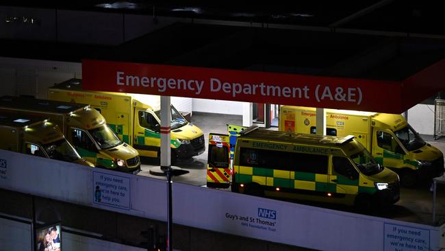 In the UK, ambulances are parked outside the Accident and Emergency (A&amp;E) department at Guy's and St Thomas' Hospital in central London as the surge in coronavirus cases risks overwhelming the hospital system. Picture: Justin Tallis/AFP