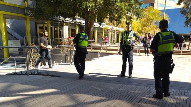 Police at the scene at Monash University's Caulfield campus. Picture: Angie Watts/Facebook