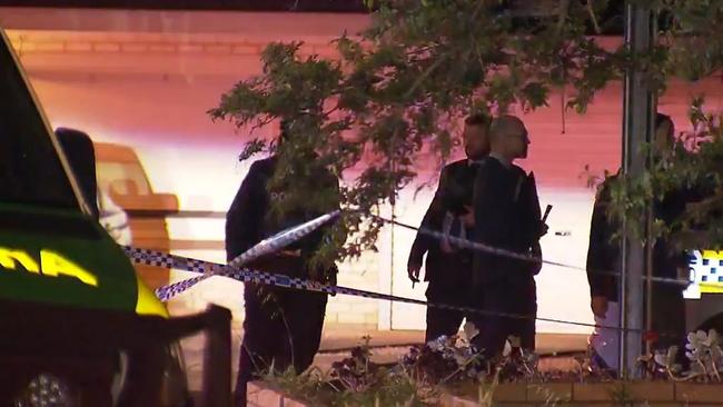 Major Crime Detectives and forensic teams attended the scene. Picture: 9News