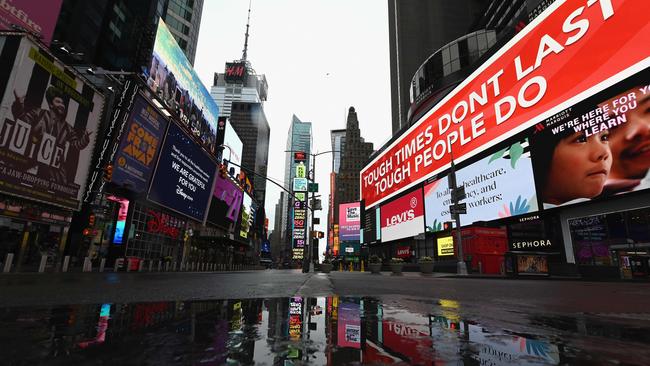 A view of a nearly empty Time Square in New York City. Another 6.6 million US workers filed for unemployment benefits this week.