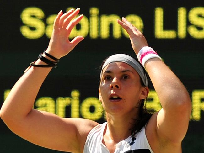 Marion Bartoli as she celebrates after beating Sabine Lisicki in the 2013 Wimbledon final.