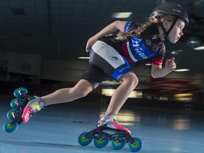 Billie Russell, 8, won eight events in her age groups at the 2017 Australian inline speed skating championships. Picture: Richard Serong