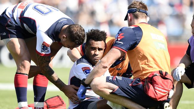 TOKYO, JAPAN - MAY 25: Will Genia of the Rebels receives medical treatment during the Super Rugby match between Sunwolves and rebels at the Prince Chichibu Memorial Ground on May 25, 2019 in Tokyo, Japan. (Photo by Matt Roberts/Getty Images for Sunwolves)