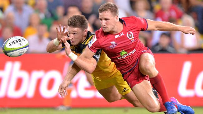 James Tuttle denies Beauden Barrett a try.