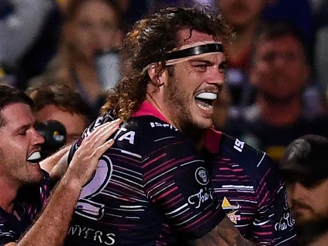 TOWNSVILLE, AUSTRALIA - JULY 22:  Ethan Lowe of the Cowboys celebrates after scoring a try  during the round 20 NRL match between the North Queensland Cowboys and the New Zealand Warriors at 1300SMILES Stadium on July 22, 2017 in Townsville, Australia.  (Photo by Ian Hitchcock/Getty Images)