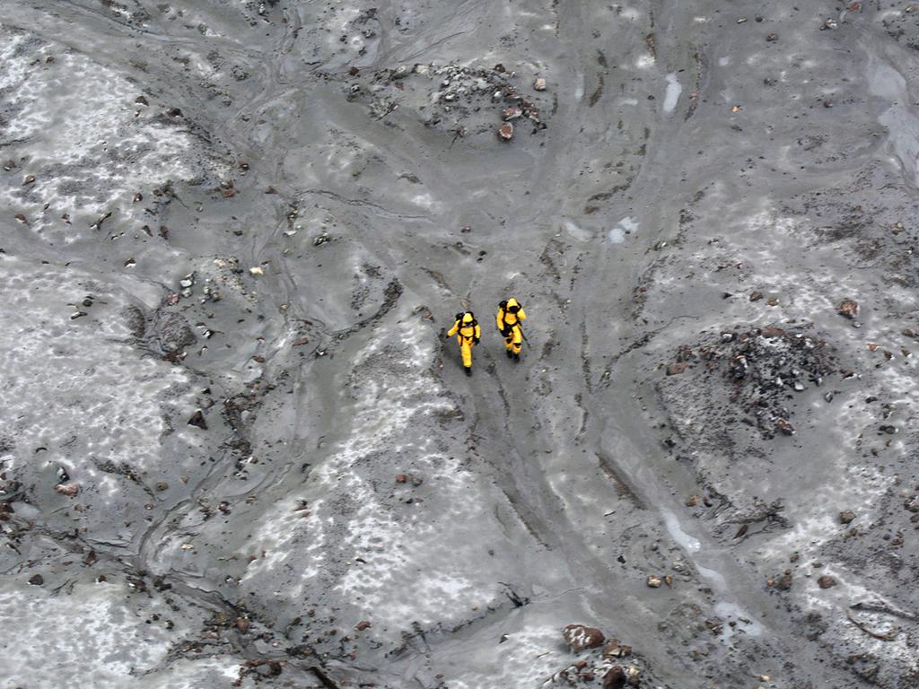 Rescuers on a mission to retrieve bodies from White Island after the December 9 volcanic eruption. Picture: New Zealand Defence Force/AFP