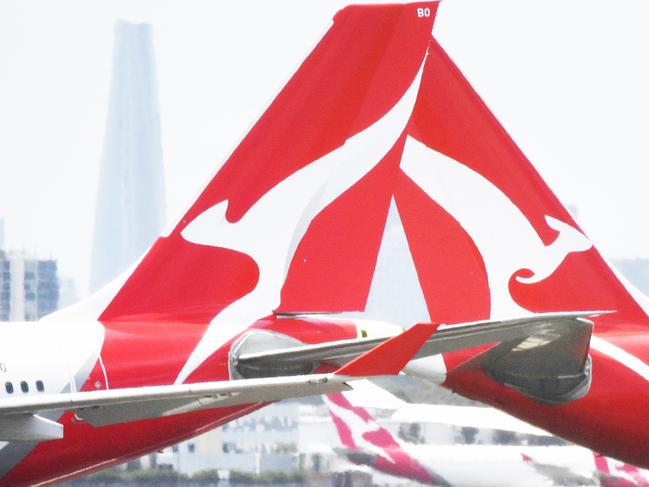 Qantas aircraft are seen at Sydney Airport, Thursday, 24 December 2020. Authorities are urgently investigating how a Qantas crew member contracted Covid-19 after arriving in Darwin from Paris and then flying to Sydney without being tested or quarantined. Federal health authorities are working with Qantas to understand how the man, who landed in Darwin on 17 December after working on a repatriation flight from Paris, became infected. Picture - Sam Mooy/The Australian Newspaperescape january 17 2021doc holiday