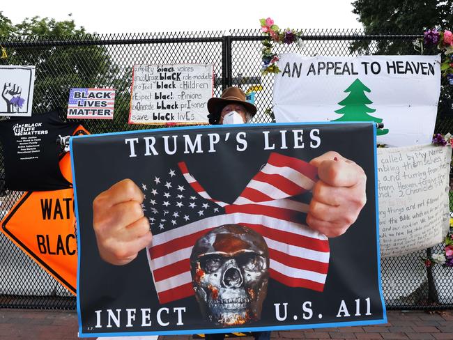 A demonstrator at Black Lives Matter plaza in Washington, DC ahead of the final night of the Republican Convention. Picture: AFP