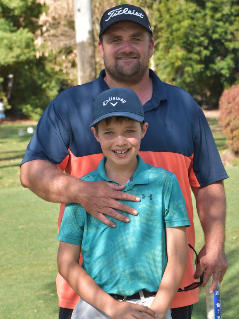 The Gold Coast's Lachlan Symons and dad Chris at the Rockhampton Golf Club in the lead-up to the US Kids Golf Foundation Australian Open being played on September 27 and 28.