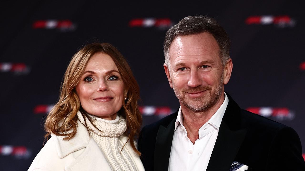 <!DOCTYPE html PUBLIC "-//W3C//DTD HTML 4.0 Transitional//EN" "http://www.w3.org/TR/REC-html40/loose.dtd"><html><body><p>Red Bull Racing&acirc;&#128;&#153;s team principal Christian Horner (right) and his wife, former Spice Girl Geri Halliwell, pose on the red carpet at F1 75 Live. Horner has been Red Bull boss for 20 years now. (Photo by HENRY NICHOLLS / AFP)</p></body></html>