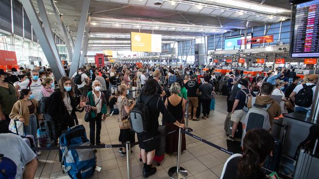 Today: Long queues at Sydney Airport's T2 Domestic Terminal this morning. Picture: Julian Andrews