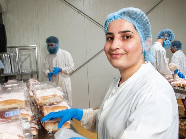 NETWORK SPECIAL.  MUST TALK WITH NETWORK PIC DESK BEFORE PUBLISHING.      Laila Matto is labelling the Cream Ice Finger packaging. Homestyle Bake Toowoomba. Has developed an energy efficient operation. 29th November 20204,; pic David Martinelli