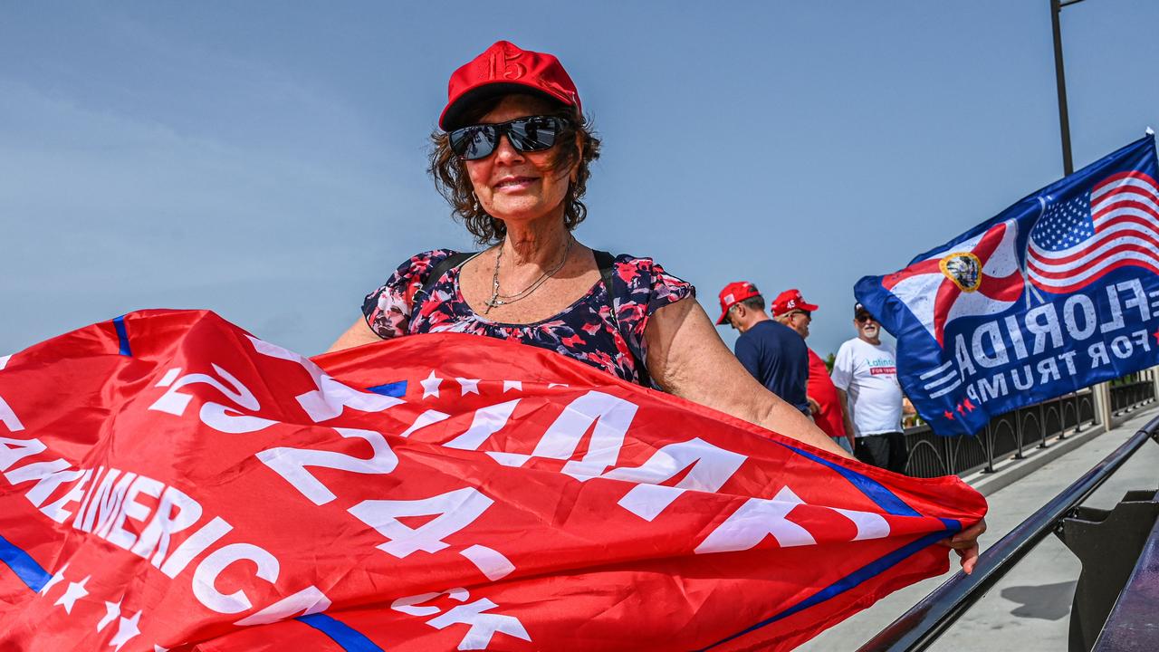 Trump supporters gather near his Florida residence, which was raided by the FBI. Picture: AFP