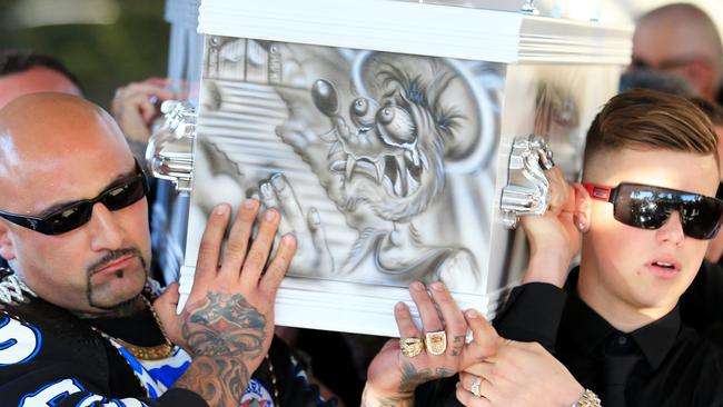 Simon Rasic's son Alex (right) carries his father’s casket. Picture: Adam Taylor