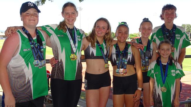 Medal-winning Ipswich and District Athletic Club competitors Sebastien Sills, Charlize Goody, Isabella Willshire, Addison Farinazzo, Acacia Wohlsen, Minaya Wohlsen and Ethan Platen in Townsville. Picture: Vic Pascoe