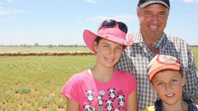 Family affair: Robert McBride, with his children Kate and James, on Tolarno Station.