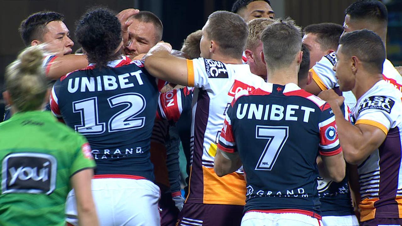 The Roosters and the Broncos scuffle.