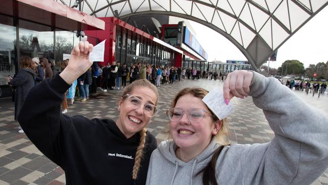 Taylor Swift fans Samantha Snell and Ebony Adams of Morphett Valet, were lucky to get their hands on a ticket by lining up at the Adelaide Entertainment Centre. Picture: Brett Hartwig