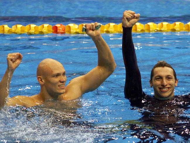 Klim and Ian Thorpe celebrate their Men's 4x200m freestyle relay final win at the Sydney Olympic Games.