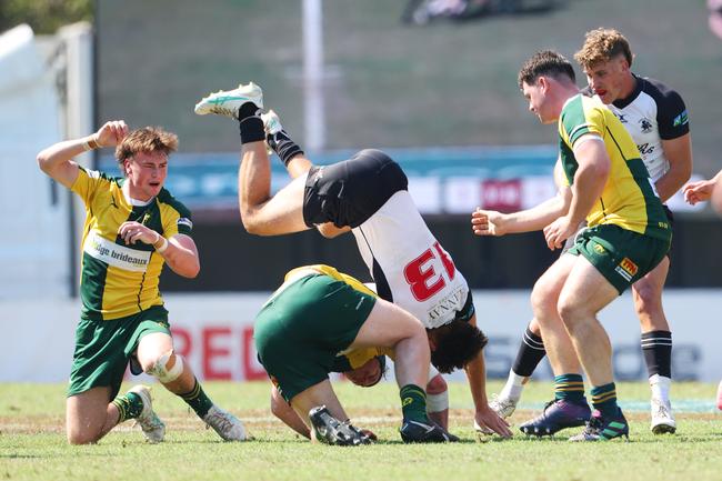 Xavier Rubens (No.13) takes a tumble in last year’s Colts 1 grand final. Picture: Lachie Millard