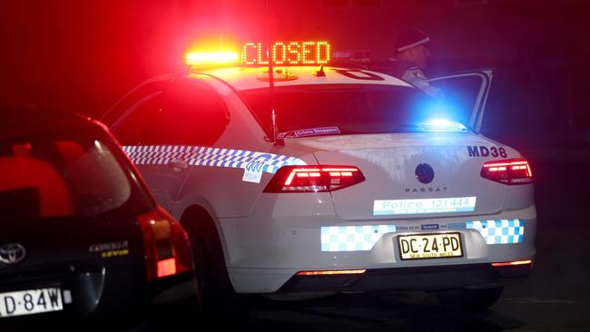 Police on Goroka St in Whalan during a police operation. Picture: Damian Shaw