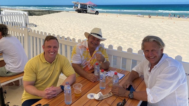 Gold Coast Mayor Tom Tate posted a pic of him and Deputy Premier Steven Miles enjoying a beer at a controversial Glitter Strip beach bar at Kurrawa.