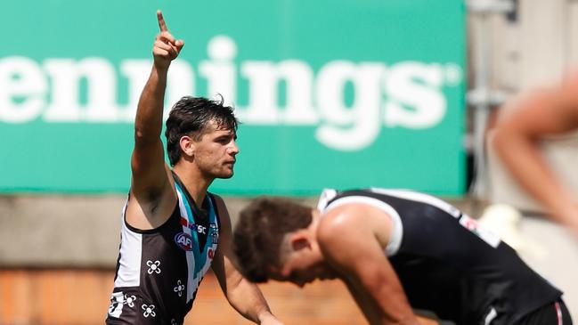 Riley Bonner celebrates one of his three goals against St Kilda in Shanghai. Picture: Michael Willson/AFL Photos)